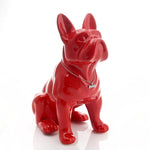 statue de chien rouge